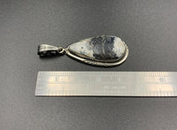 White Buffalo #7 Sterling Silver Pendant